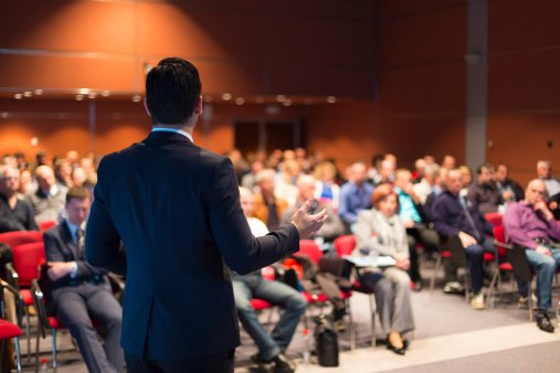 Man speaking at corporate event