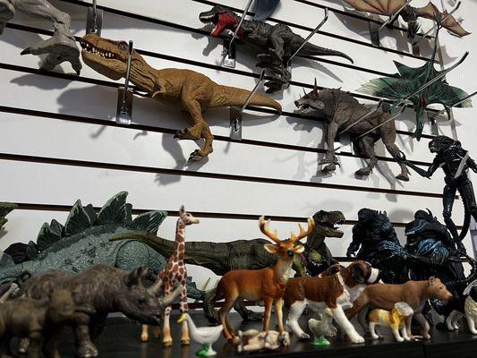 Many figures from dinosaurs to animals