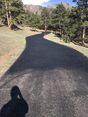 Adding a high quality sealer to existing asphalt to beautify your property and add years more durability.