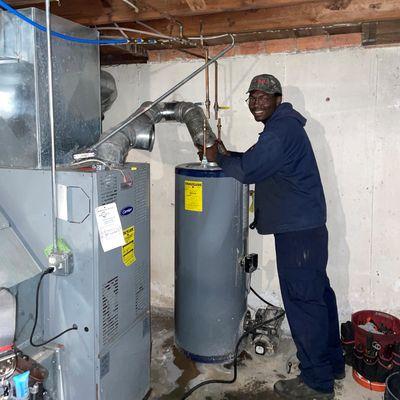 Romell Installing Hot Water Heater