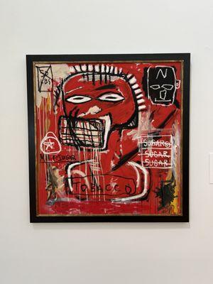 sample art (Basquiat with two by Warhol on the opposite of the divider - nice pairing!)