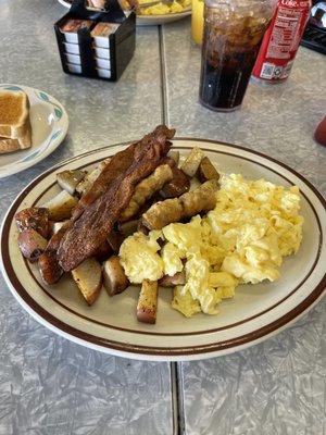 Bacon, sausage, fluffy eggs and some country potatoes. Food was great