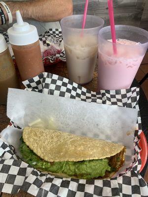 Best birria quesadilla ever. Strawberry drink and horchata! So good!