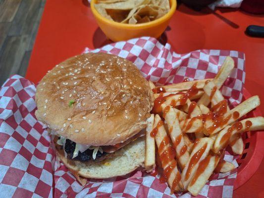 The burger and fries was delicious. We also tried the chips and salsa, and omg the salsa was delicious.