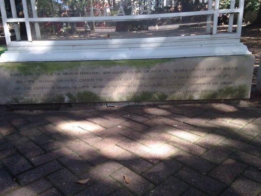 Under the glass memorial of his famous quote.