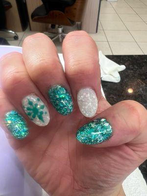 Powder dip manicure with customized gel art.