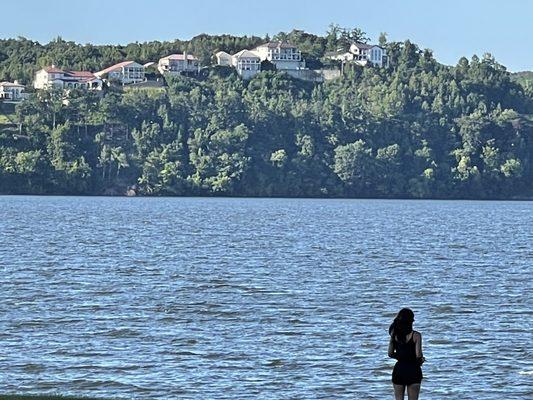 Young women's Standing at Beach in Pickwick dam state park