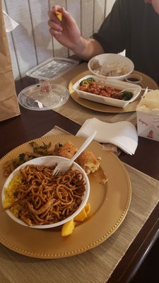 Chicken lo mein pork fried rice and egg roll (bottom) Sesame chicken and steamed dumplings