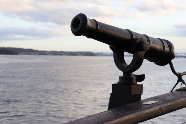 Cute little faux cannons all along the ship. Backdrop: Woodrow Wilson Bridge.