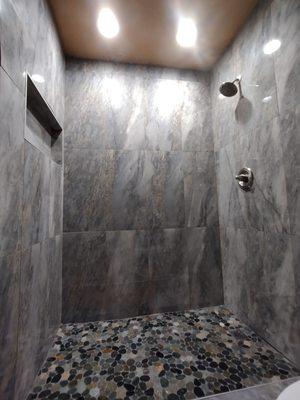 Basic walk in shower,custom floor,with porcelain tile