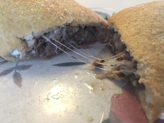 Mushroom/steak/cheese calzone and a beautiful '80s floral plate!