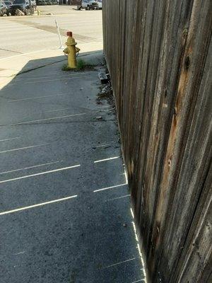 Trash and rusty nails in the community/property fencing