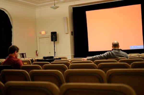 Screening room before it filled up with attendees.