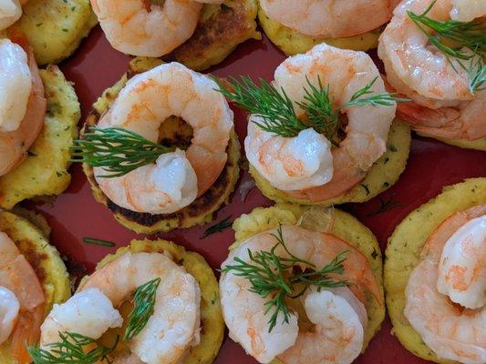 Poached shrimp and herbed potato pancakes