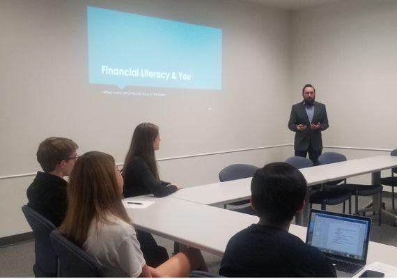 CARBON's Chris Holly explains the basics of financial literacy to middle school and high school students from Houston, Texas.