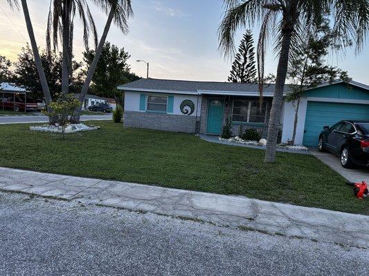 A customer asked to have lawn mowed and rocks added around palm tree. For rocks and lawn edge bricks I usually charge 60-100