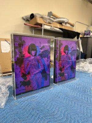 My artwork in the custom acrylic frames.