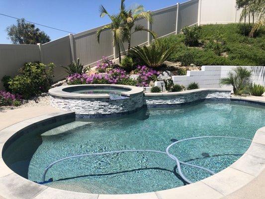 Back yard pool.  He designed the pool to perfectly fit my smaller yard.