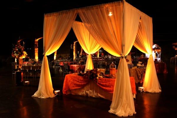 We do draping too! We did this open top pavilion for a bride and groom's table.