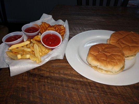 Shredded chicken sandwiches and fries.