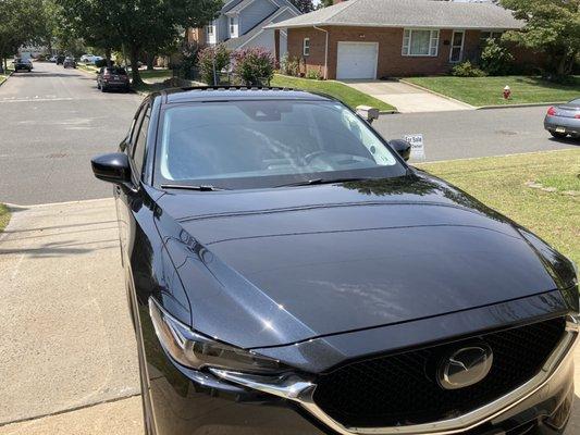 Mazda CX-5 that's been detained in and out. Also, window tinting.