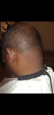 High taper fade on sides and back of neck