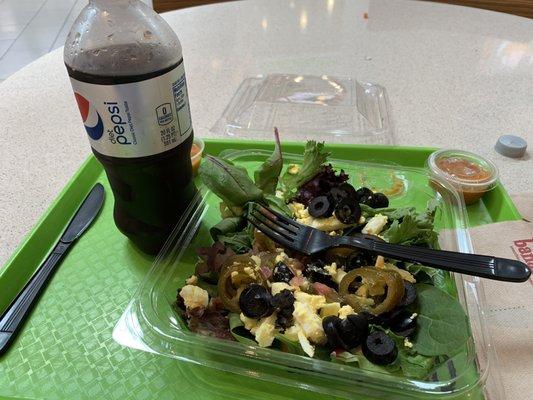 Salad with standard 4 picks and a Diet Coke, 14.85.  Ridiculous