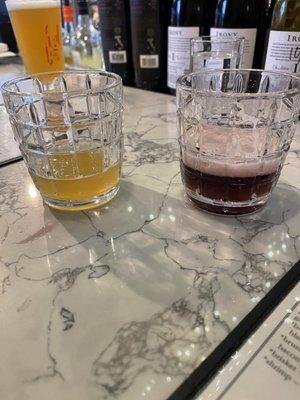 Samples of house made apple cider ginger beer and blueberry ginger beer