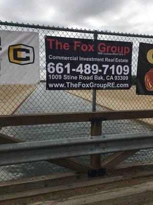 Golf tournament banner advertisement. The Fox Group was one of the sponsors.