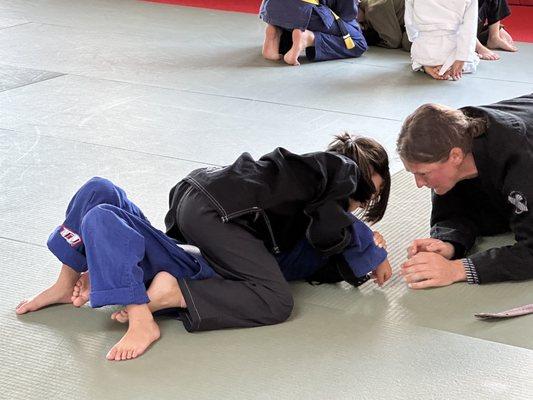 Sensei Nathalie teaching the small kids the finer points of the Americana.