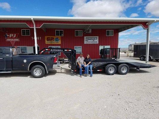 This couple came all the way from Artesia for their custom built tilt gooseneck trailer which they needed for their towing business.