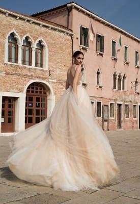 Inbal Dror wedding dresses available at www.DimitrasBridal.com in Chicago.  By appointment, 312.787.0920 or info@dimitrasbridal.com.