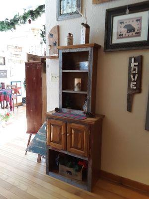 This little cabinet is made from a repurposed Ent. center and old barn boards.