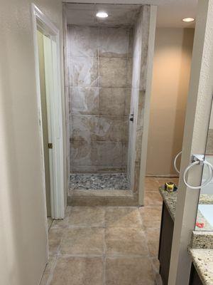 We have upgraded shower to 4'x8' shower and are at the second wipe down of grout dust.