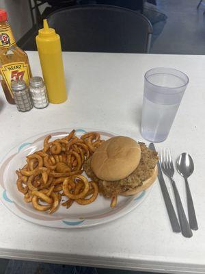 Chicken fried steak sandwich and curly fries. Cannot be beat.