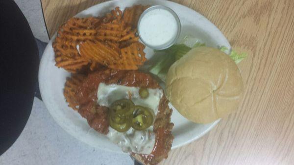 Favorite menu item..Buffalo chicken sandwich with sweet potato waffle fries.