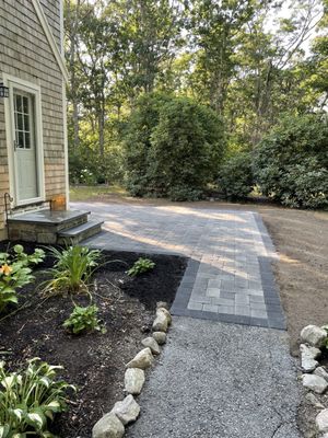 After - graduated walkway to raised patio area