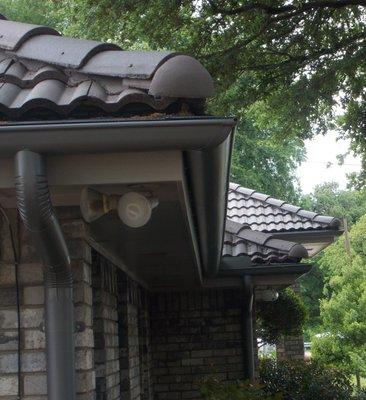 Half round gutters with round downspouts