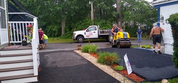 Finishing off one of the many driveways completed that day.