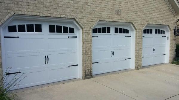 Theses three Carriage house garage doors we installed helped give our customer's home the curb appeal they wanted.