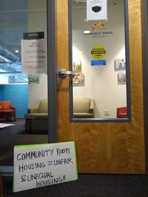 They wouldn't even answer questions about why they denied housing to homeless disabled people at their office, and locked the door.