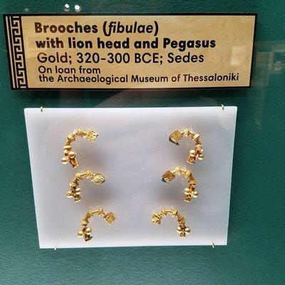 gold brooches