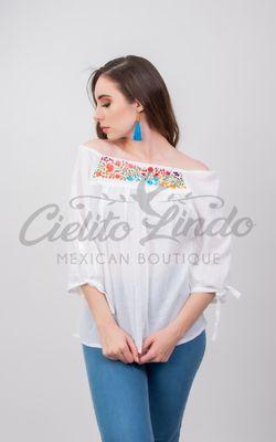 Cozumel blouse made in cotton with silk thread hand embroidery. One Size fits S/L available in several colors