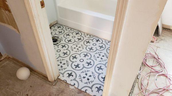 Bathroom floor re-tiled