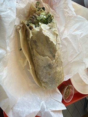 Carnitas burrito so good!  Huge and the flavor!  Yum