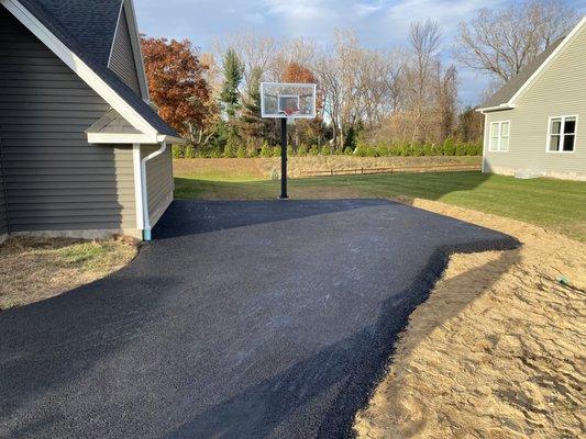 Purchasing a basketball hoop? Let us take care of the install for you. We also installed this beautiful asphalt court!