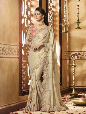 Baige saree with light pink embroidery work