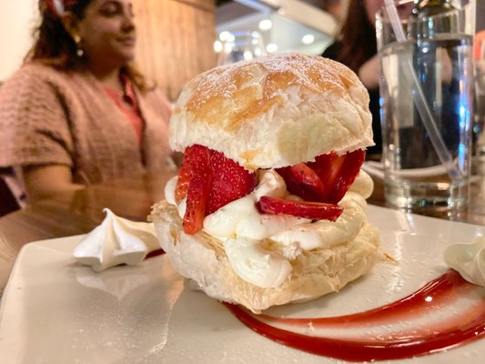 Strawberry with puff pastry and whipped cream