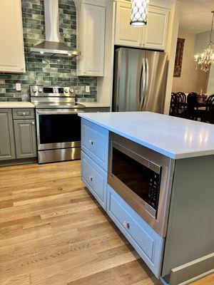 When relocating the microwave into the island, a built in trim kit is the key to a sleek look.