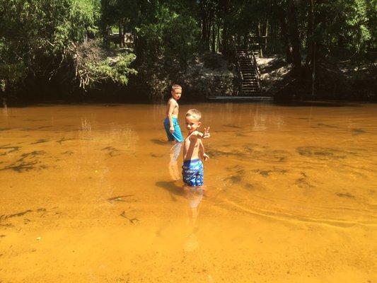 The river was low enough that the kids could play in it, also water was very clear and flowing.